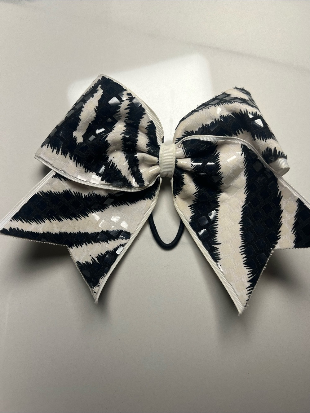 Cheerleading bow hair tie